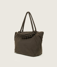 Load image into Gallery viewer, Nylon I Pazar Tote M I brown plant dyed japanese nylon I side view I showing the iconic SAGAN closure strap I white background