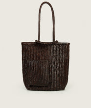 Load image into Gallery viewer, Woven I Pazar Book Tote Handwoven I brown I front view I showing the iconic SAGAN closure strap and the front Book pocket I white background