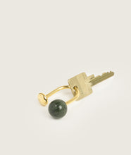 Load image into Gallery viewer, Accessories I Carl Auböck x SAGAN Vienna Stone Keychain Imaginary Green Planet with Key I white background