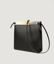 Load image into Gallery viewer, Gwyneth handbag, Size M, made from Italian smooth calf leather. The front plate is made from the cow horn. Shoulder strap is adjustable and in the function of easy closing and opening the bag. 