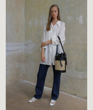 Load image into Gallery viewer, Vienna bucket bag, size M in black from Italian calf leather. Short signature hand knotted handle with additionally long thin removable shoulder strap. Inner pocket. D-key ring.