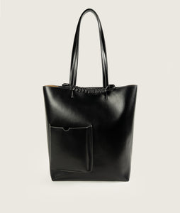 Pazar I Pazar Book Tote Grape Leather I Black with white Stitching I showing the iconic closure system and the outside book pocket I also showing the even more stable straps I white background