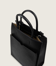 Load image into Gallery viewer, Pazar Magazine Tote Black I top inside view I showing the magazine pocket and the signature braided handle I white background