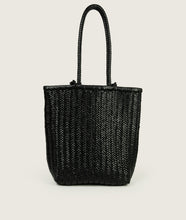 Load image into Gallery viewer, Woven I Pazar Book Tote Handwoven I black I back view I showing the iconic SAGAN closure strap and the front Book pocket I white background 