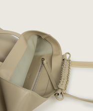 Load image into Gallery viewer, Pazar I Pazar Book Tote Beige I beige I inside view I showing outside book pocket and iconic SAGAN closing strap I white background