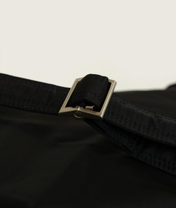 Nylon I Messenger bag M Black recycled nylon I black I detail buckle view I white background