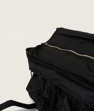 Load image into Gallery viewer, Nylon I Messenger bag M Black recycled nylon I black I inside view I showing inside pocket and zip detail I white background