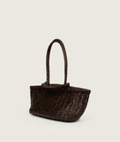 Load image into Gallery viewer, Woven I Pazar Tote Boat Handwoven I brown I from aside I showing the iconic closure I white background