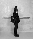 Load image into Gallery viewer, Woven I Pazar Book Tote Handwoven I brown I women wearing the bag over her shoulder I black and white picture in the SAGAN Vienna Shop