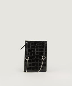 Gwyneth bag, size S, black, made from Italian calf leather with croco effect embossed. The front plate is made from cow horn. Fine chain shoulder strap. The shoulder strap is also in the function of easy closing and opening the bag. This size is suitable for all iPhone sizes. Modern and elegant.