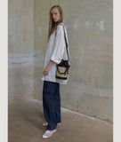 Load image into Gallery viewer, Vienna bucket bag, size S in black from Italian calf leather. Short signature hand knotted handle with additionally long thin removable shoulder strap. Inner pocket. D-key ring.